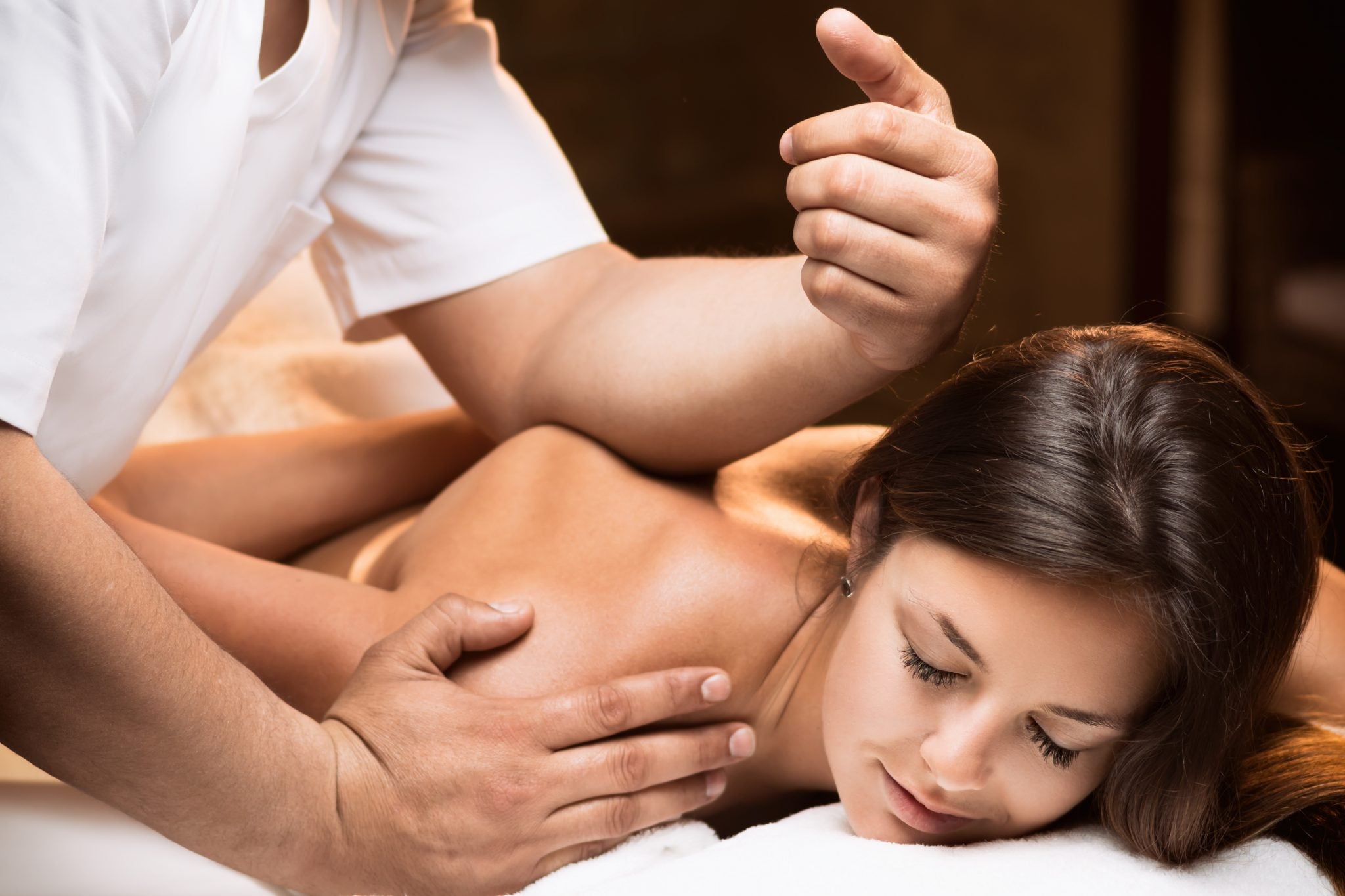 Therapist performing a relaxing massage at Janjao Thai Spa